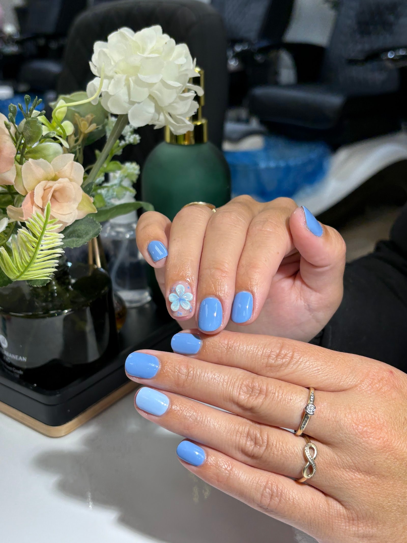 Blue nail design at Kittie Nails and Beauty